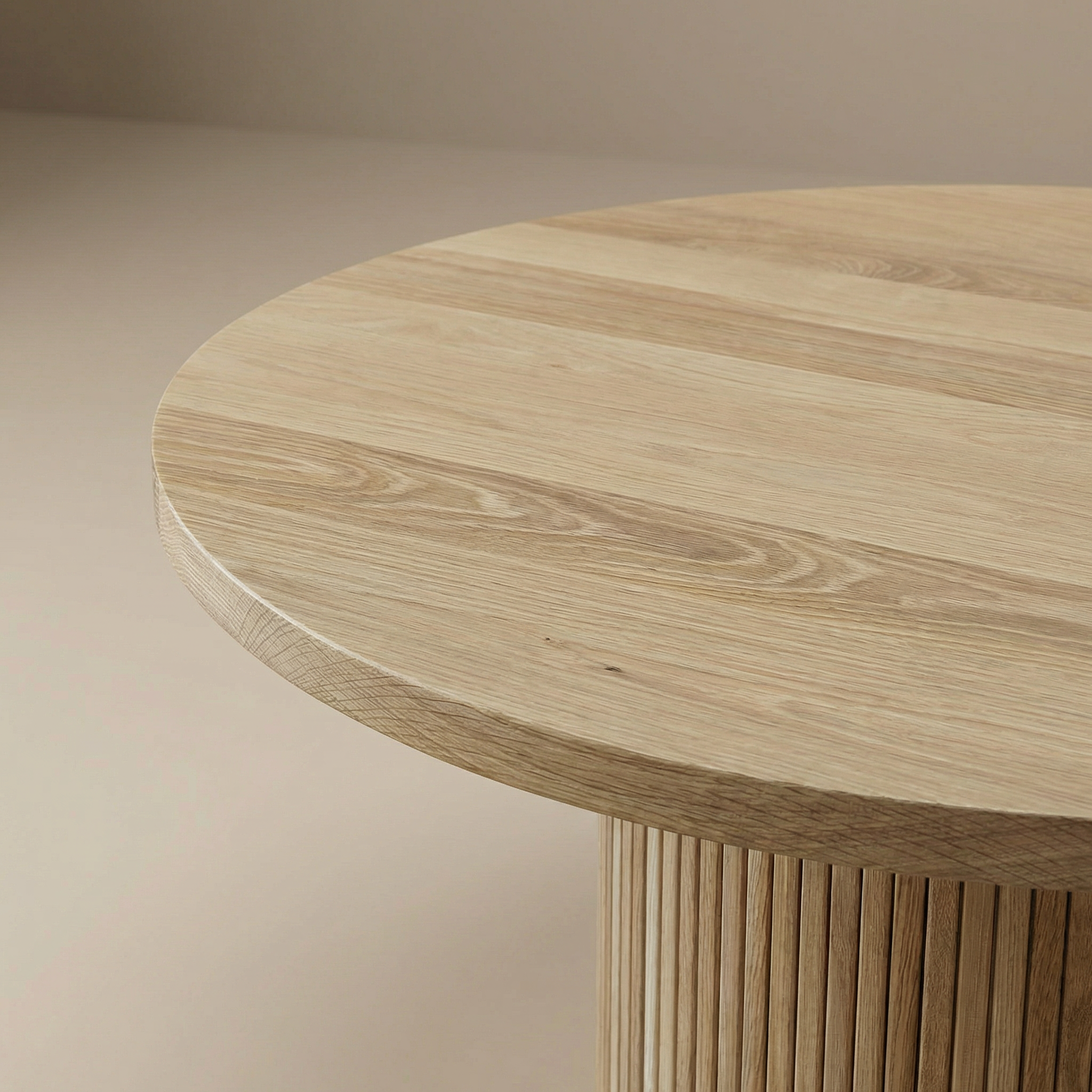 Wooden round table with a beige background white oak berkeley table