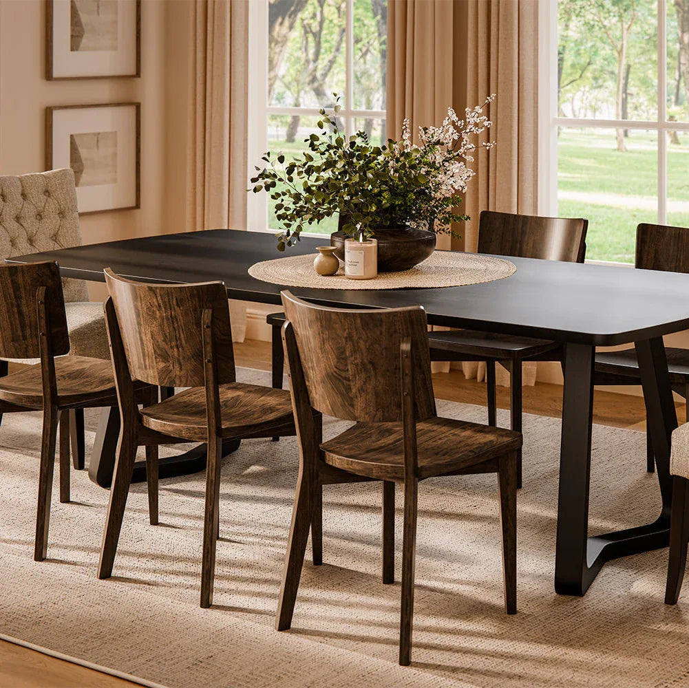 Bethany dining table with black base in a dining room