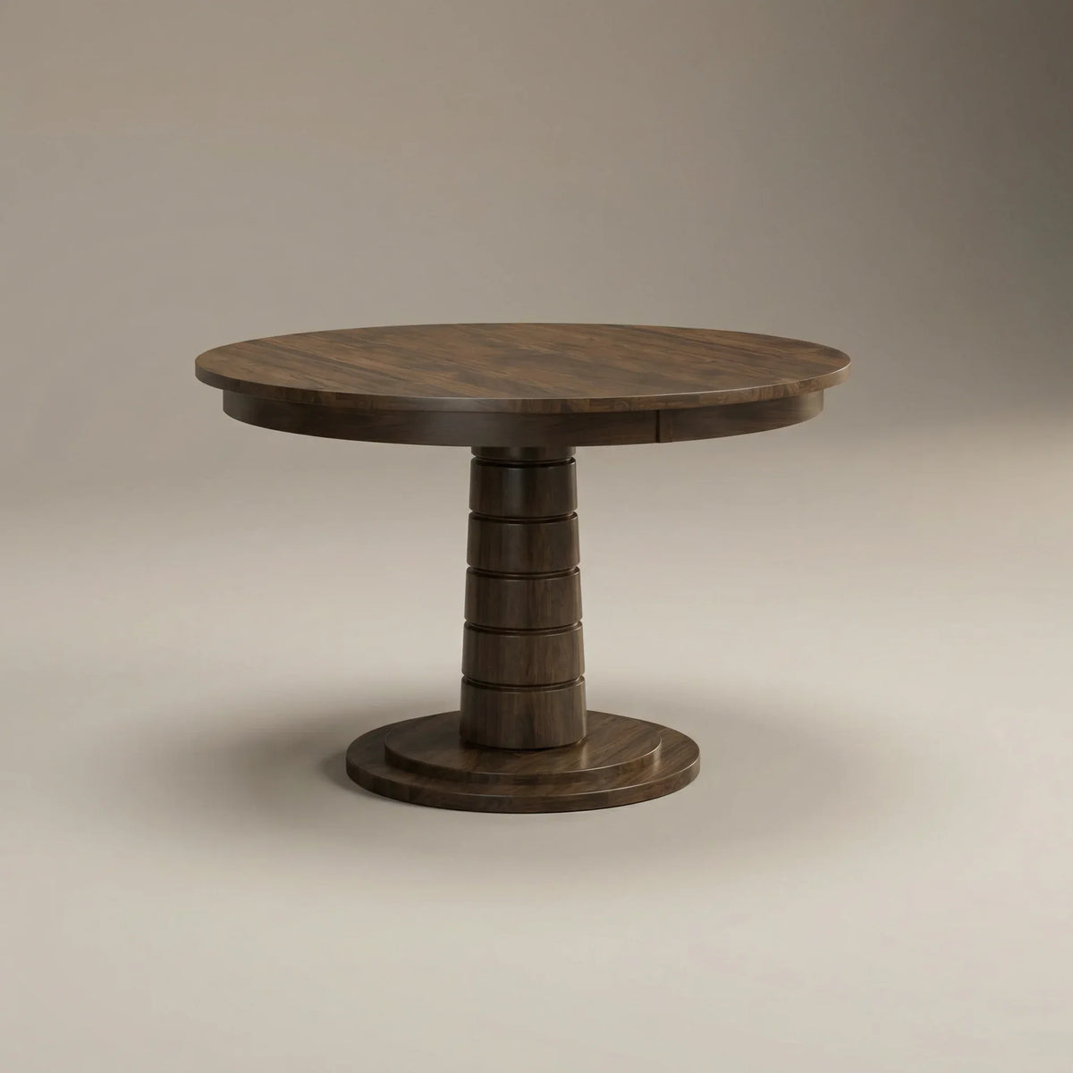 Kestrel walnut round dining table with pedestal base