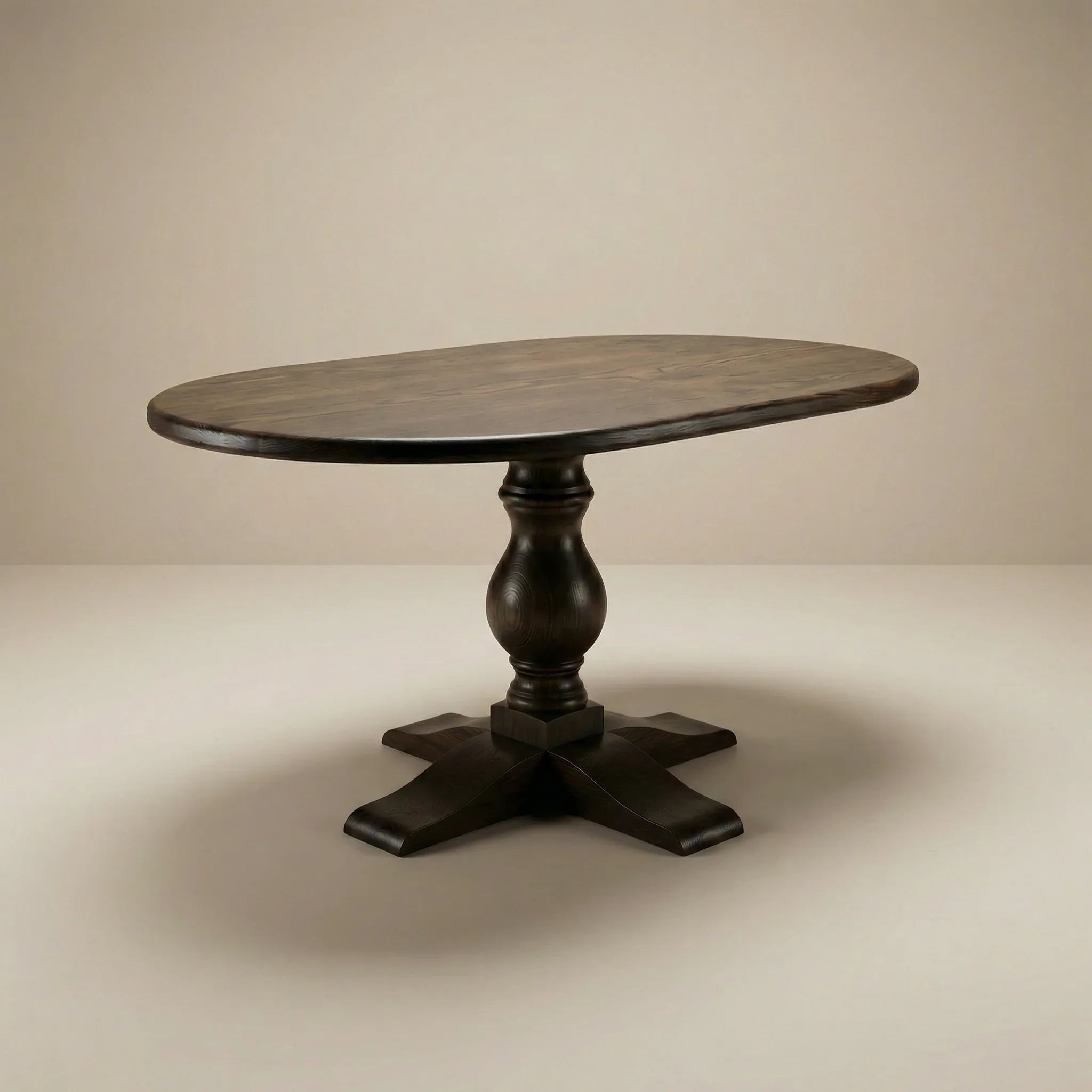 Round wooden table with a dark finish on a beige background