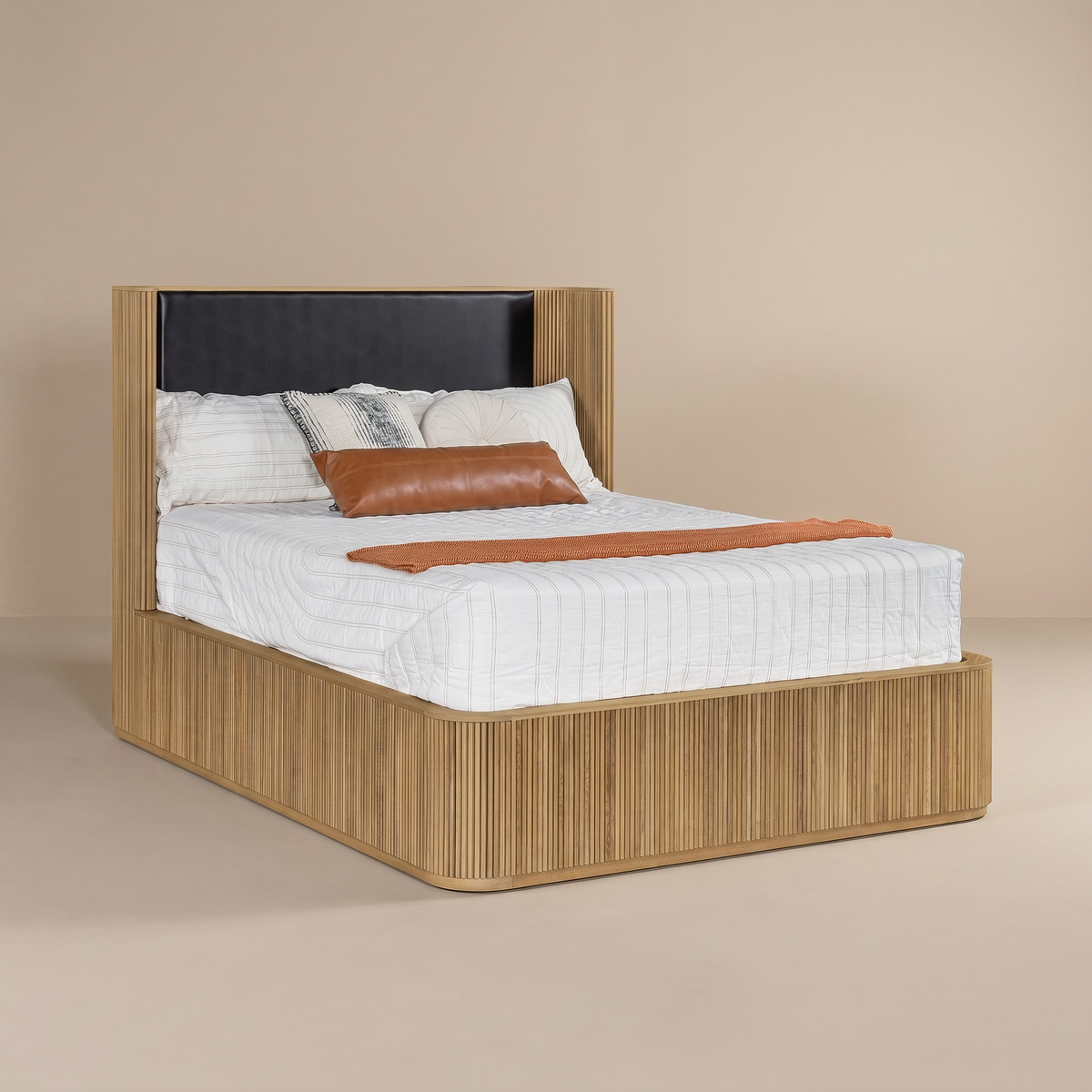Sundance bed with reeded base and leather headboard