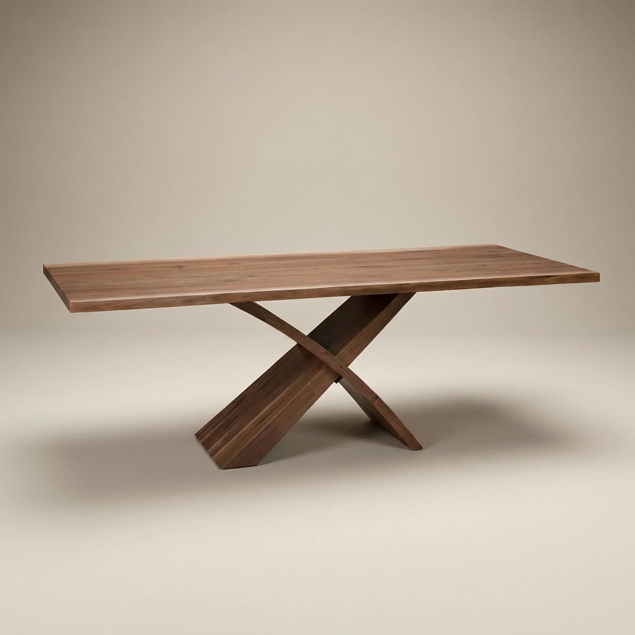 The Vestavia walnut live edge table and X sculpted base