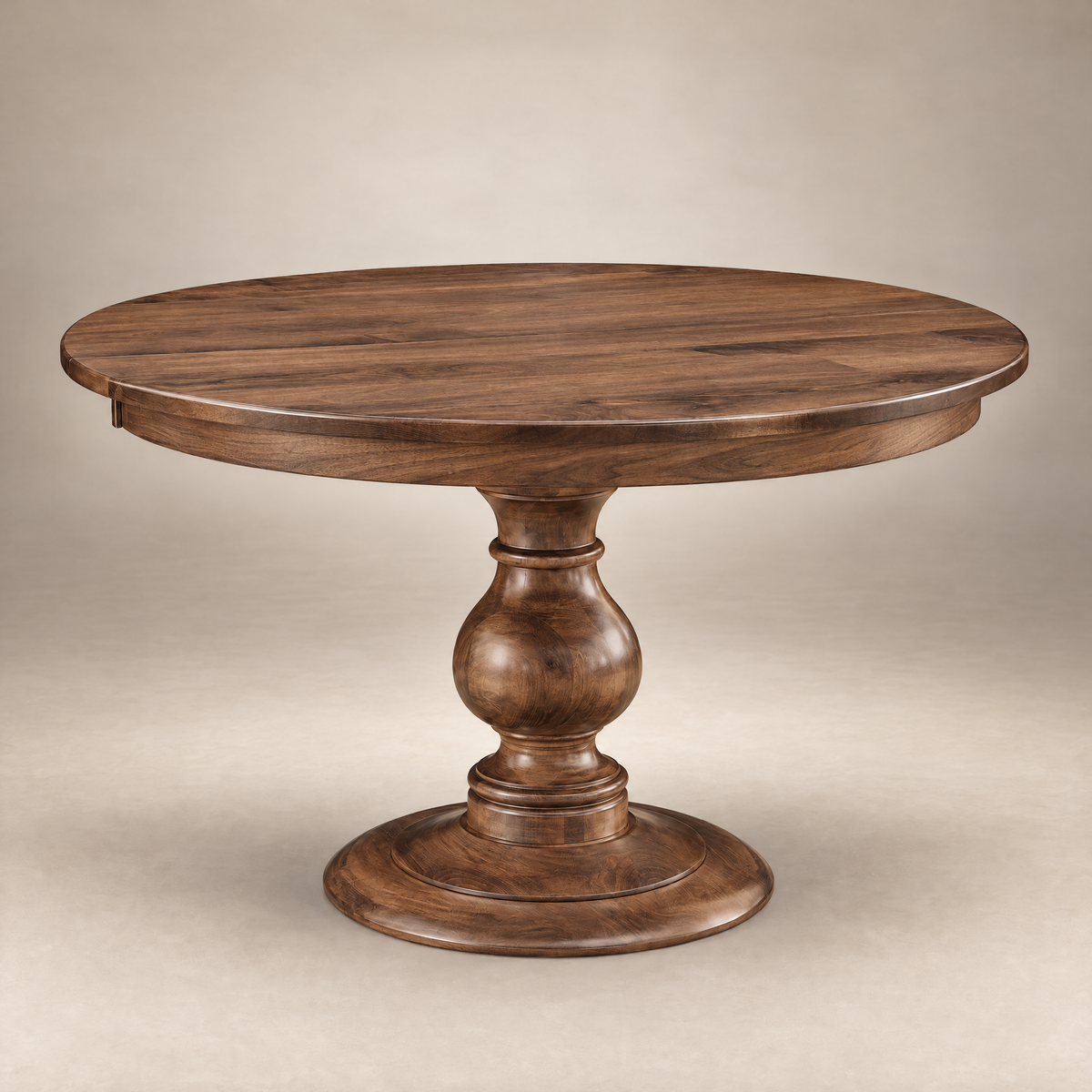 Bryce round dining table in walnut with turned pedestal base