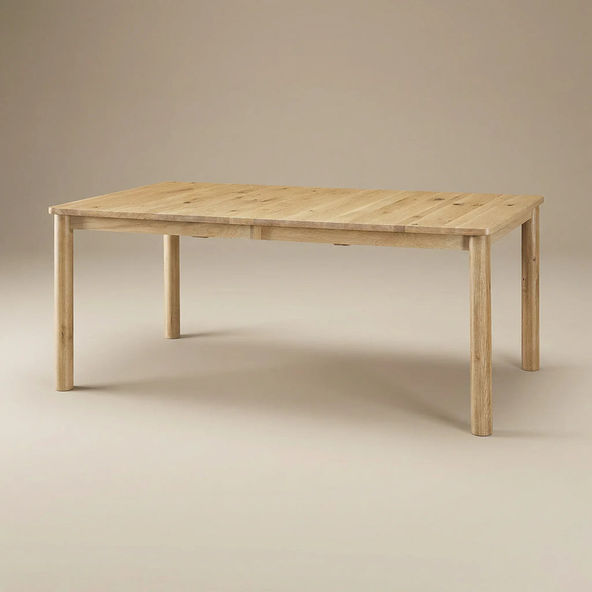 Crestview dining table with rounded tapered legs