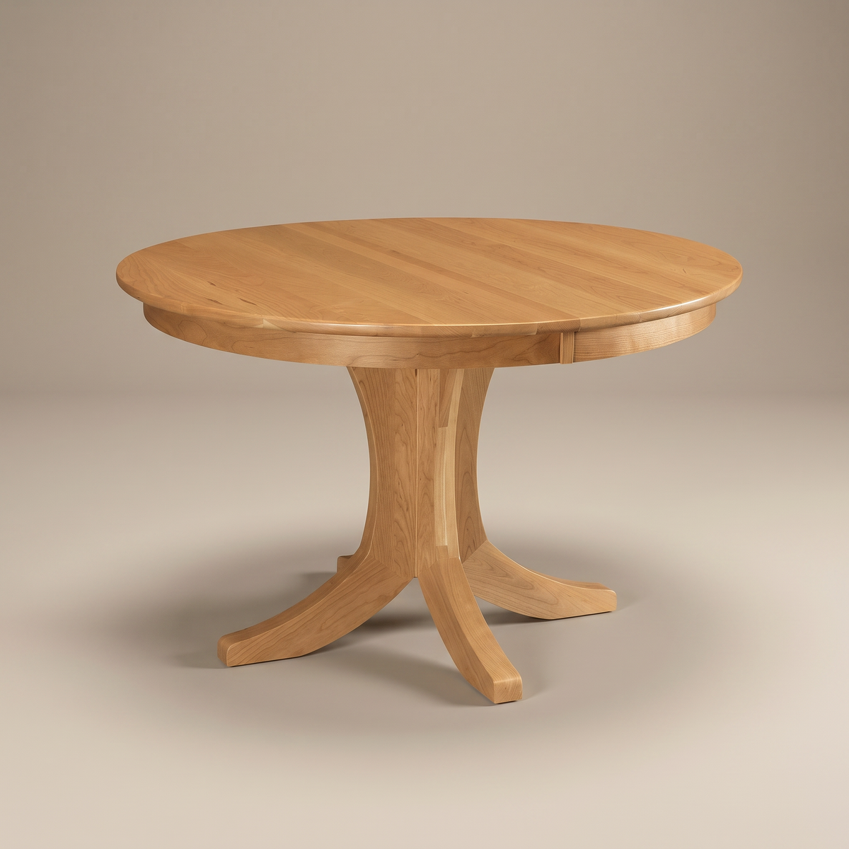 Linden round dining table with splayed pedestal base
