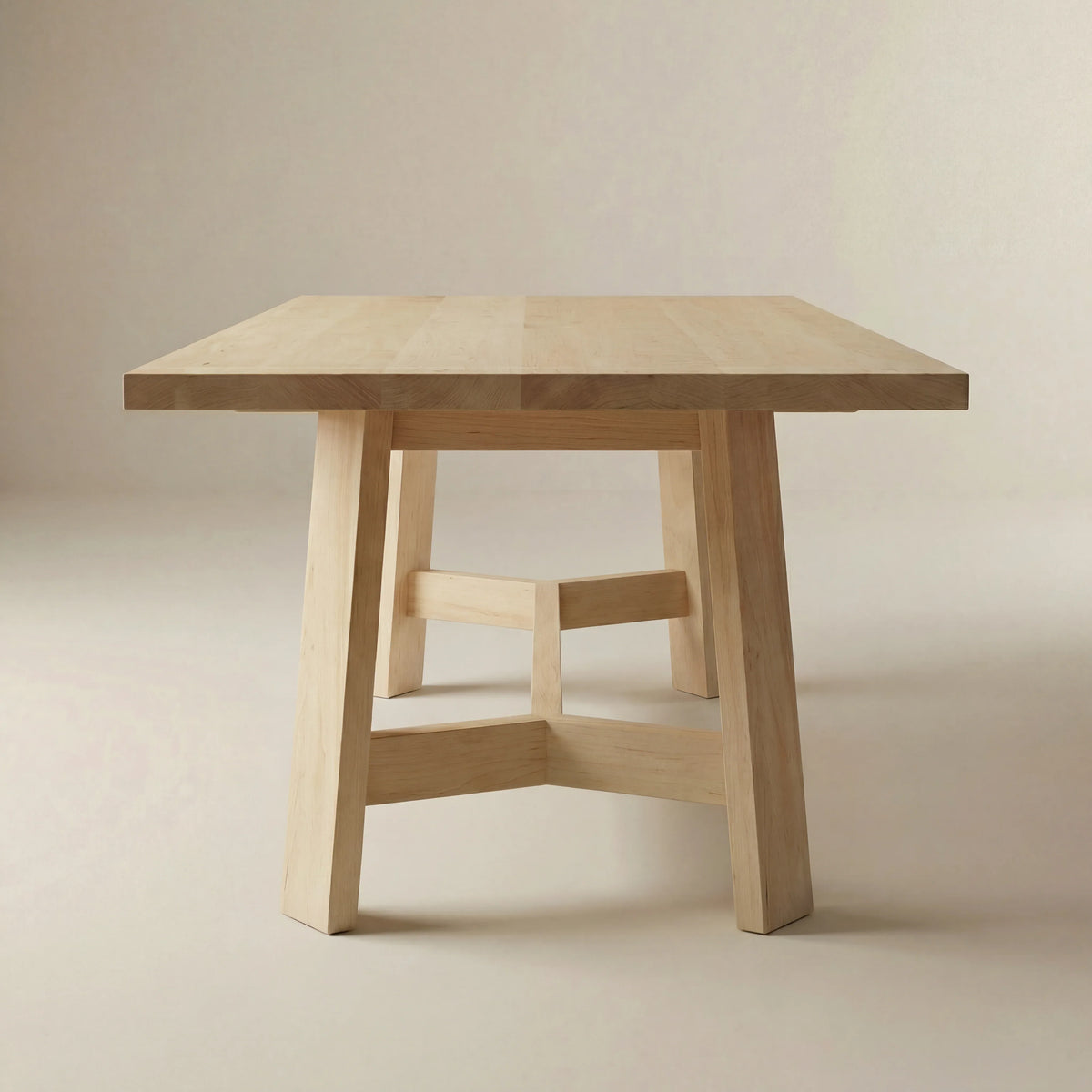 Prescott dining table with four-leg base and stretcher