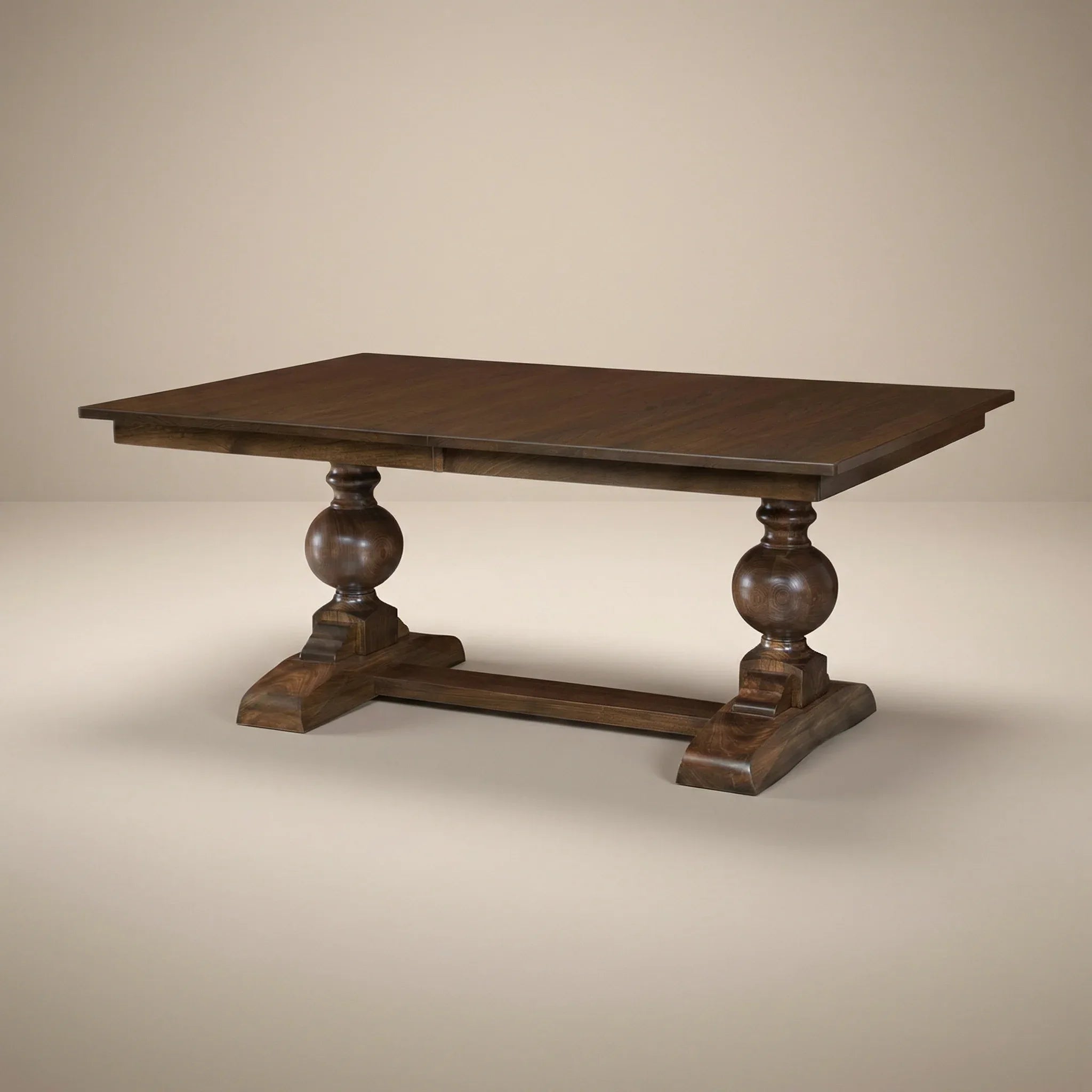Wooden table with decorative legs on a beige background